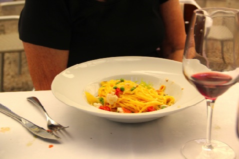 Tagliolini pasta with sea bass, saffron fennel and peas