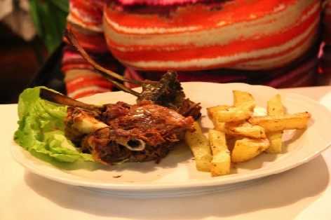 Roasted young goat (thankfully not an old goat) with potatoes