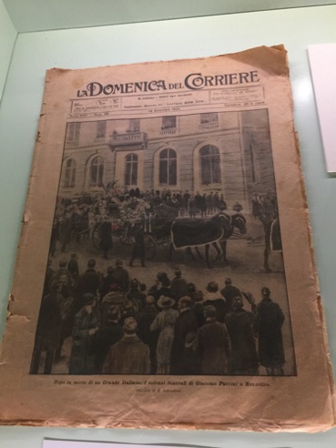 newspaper photo of funeral procession